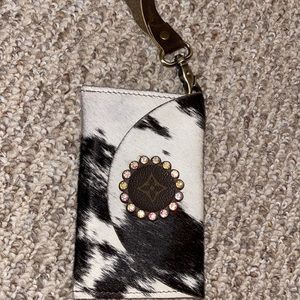 Upcycled LV wristlet with faux fur.
